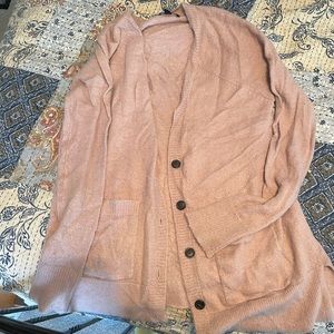 Lightly worn, soft pink cardigan with button details